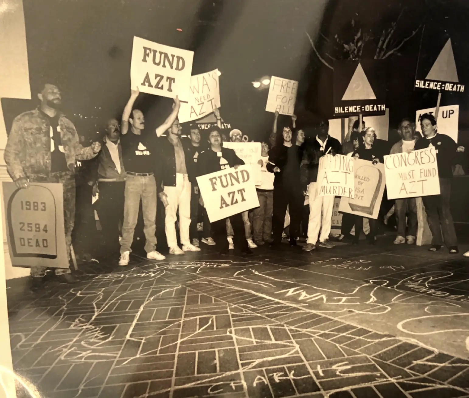 People protesting in support of funding AZT